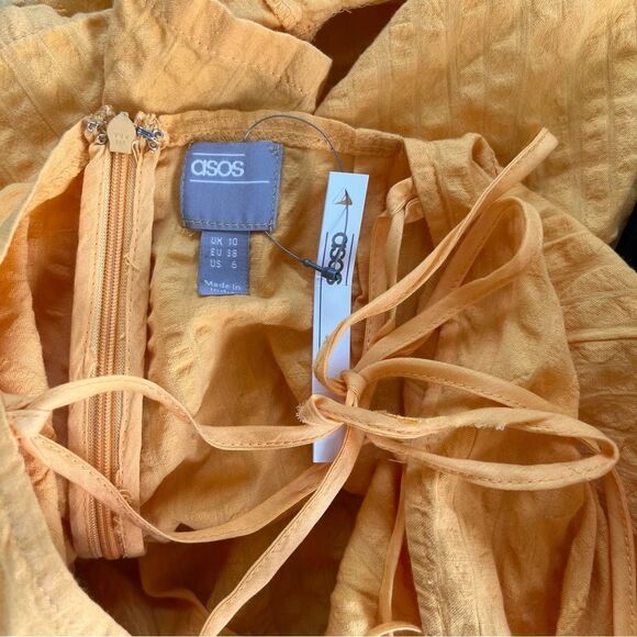 ASOS Yellow Seersucker Puff Sleeve Lace Up Back Romper - Picture 12 of 13